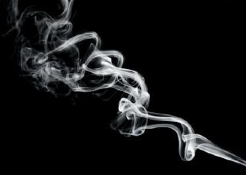 Premium Photo , Abstract form of smoke in black and White on a black background