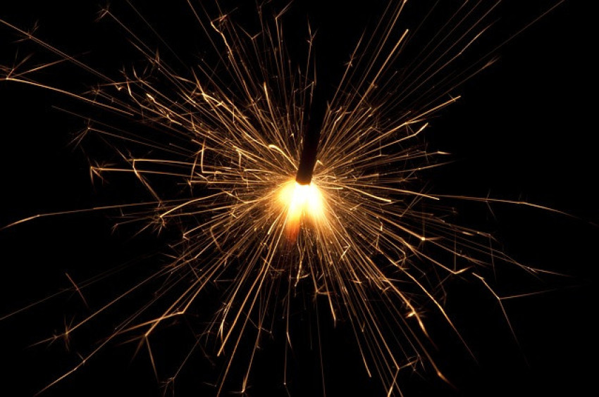 Fire sparklers with light effect on black background png free download