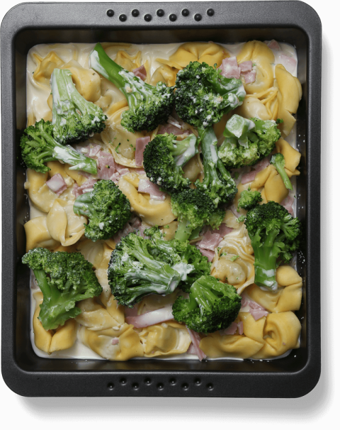 Tortellini Meal,Roasted Broccoli,Tortellini And Onion Mixed In Black tray,HD Tortellini Meal Photo Free Download PNG Image,Transparent Background